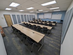 Desks in room 250 Van Hise
